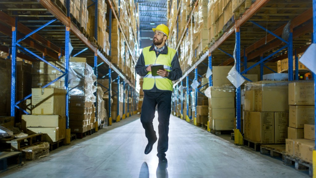 Employee inspecting the warehouse