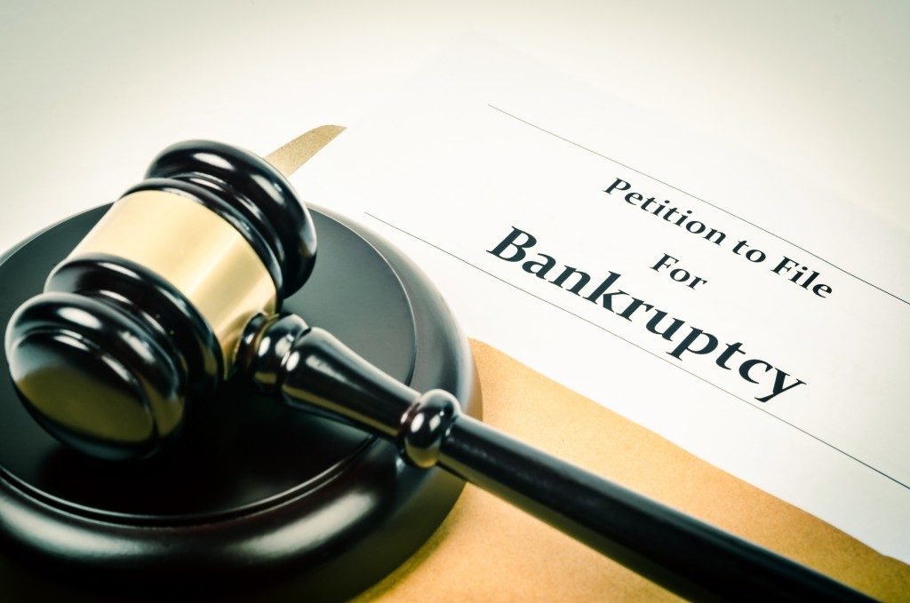 A gavel and bankruptcy form