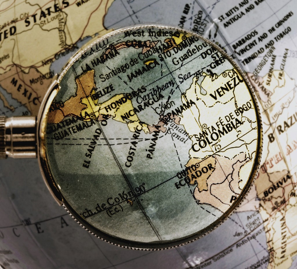 magnifying glass on globe