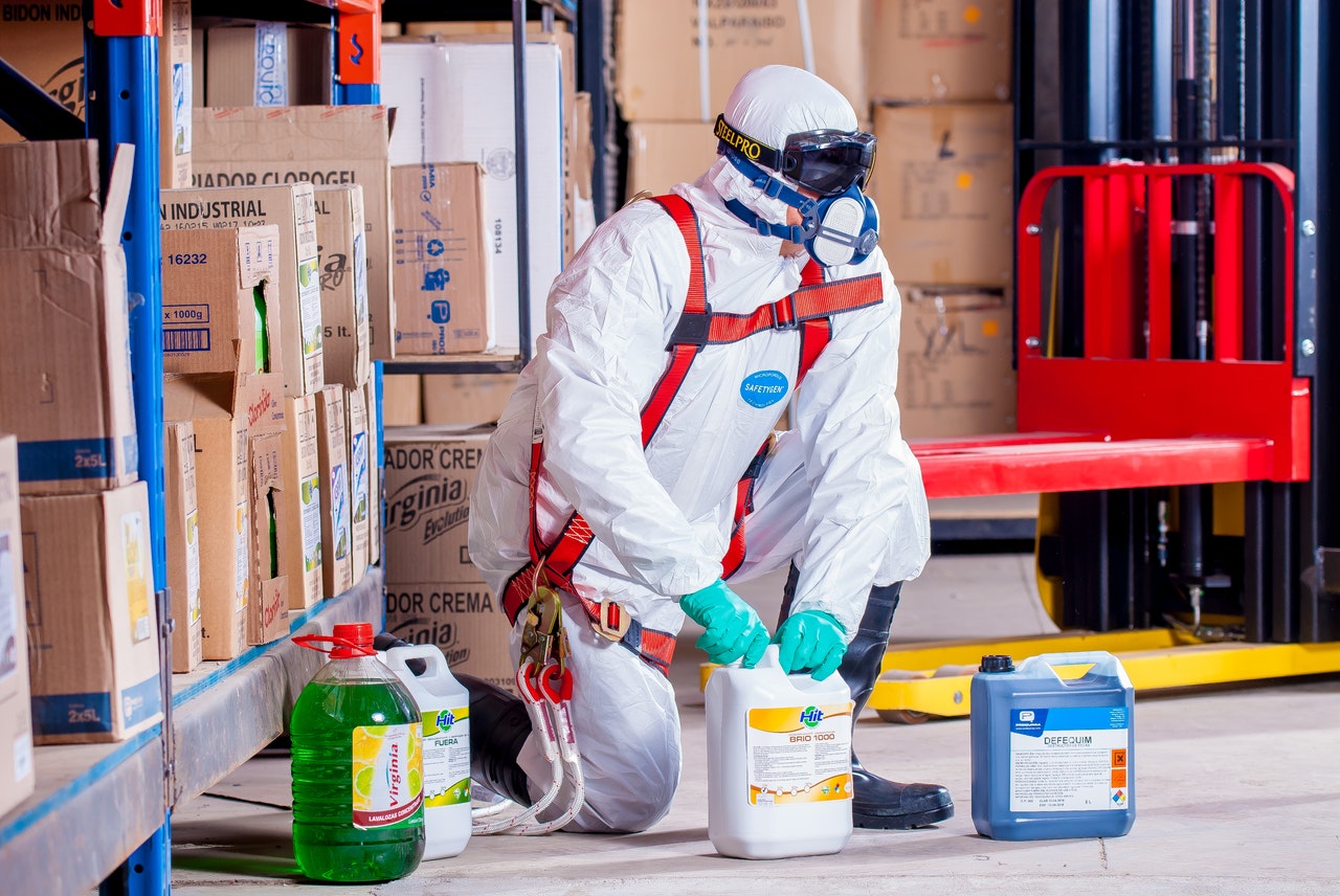 cleaning service wearing full PPE