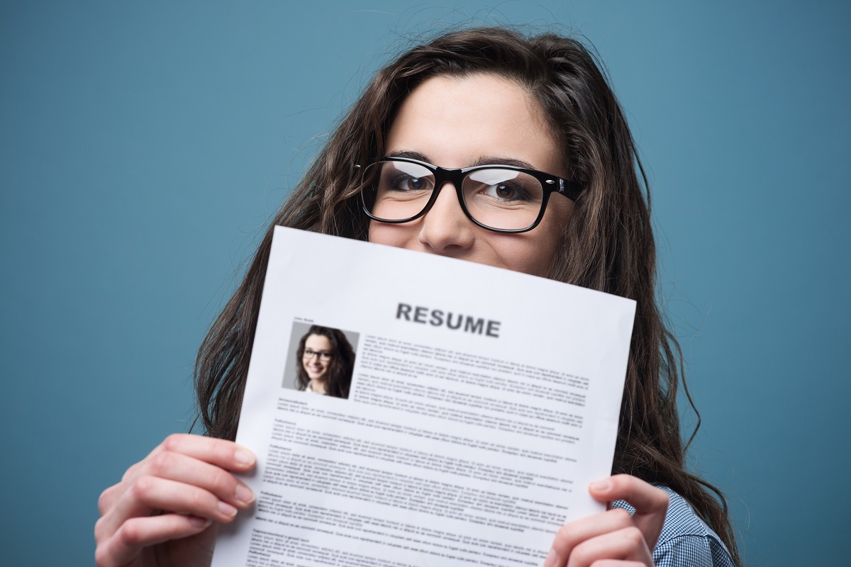 woman showing her resume